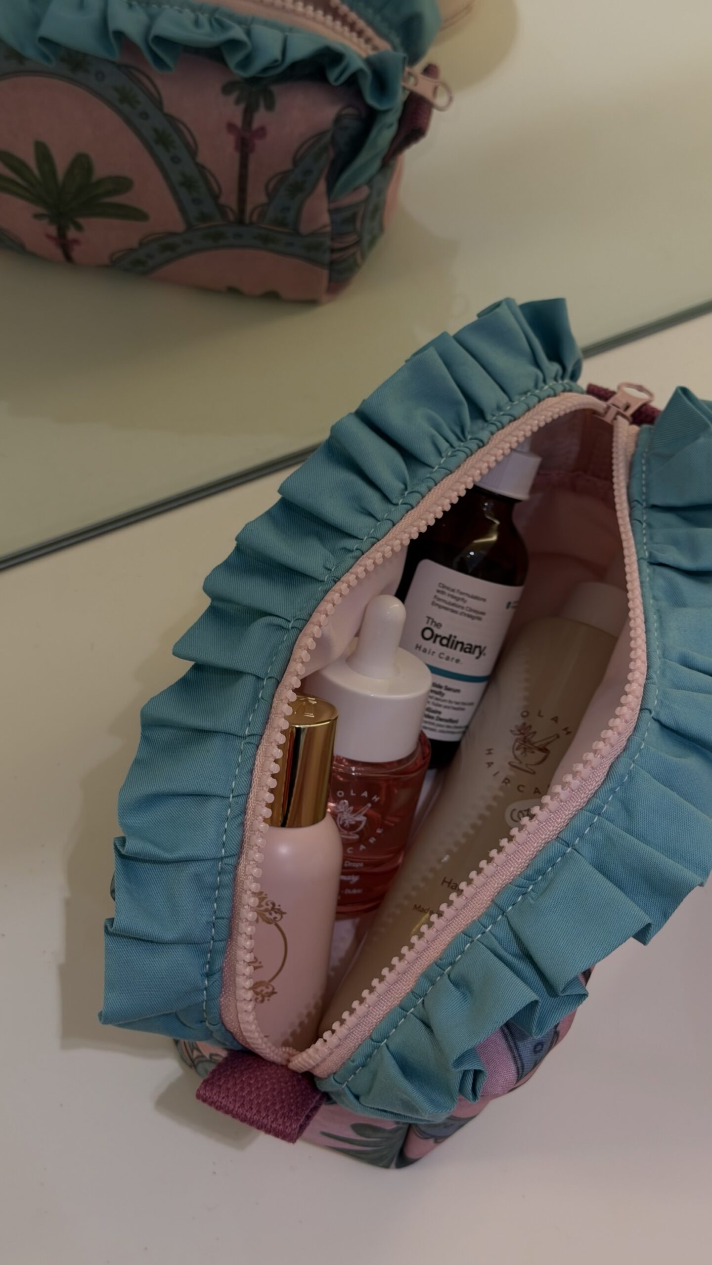 The Ruffled Palm Pouch